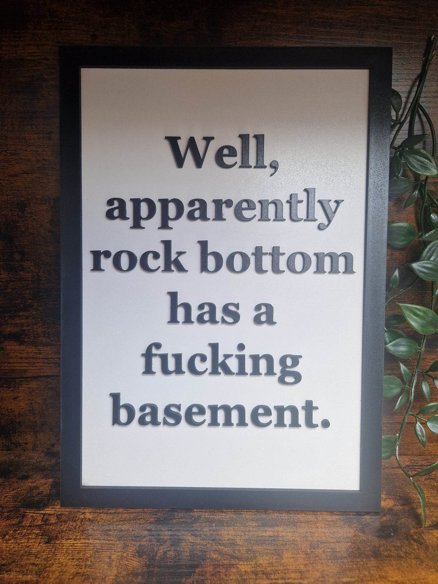 Rock bottom funny sign