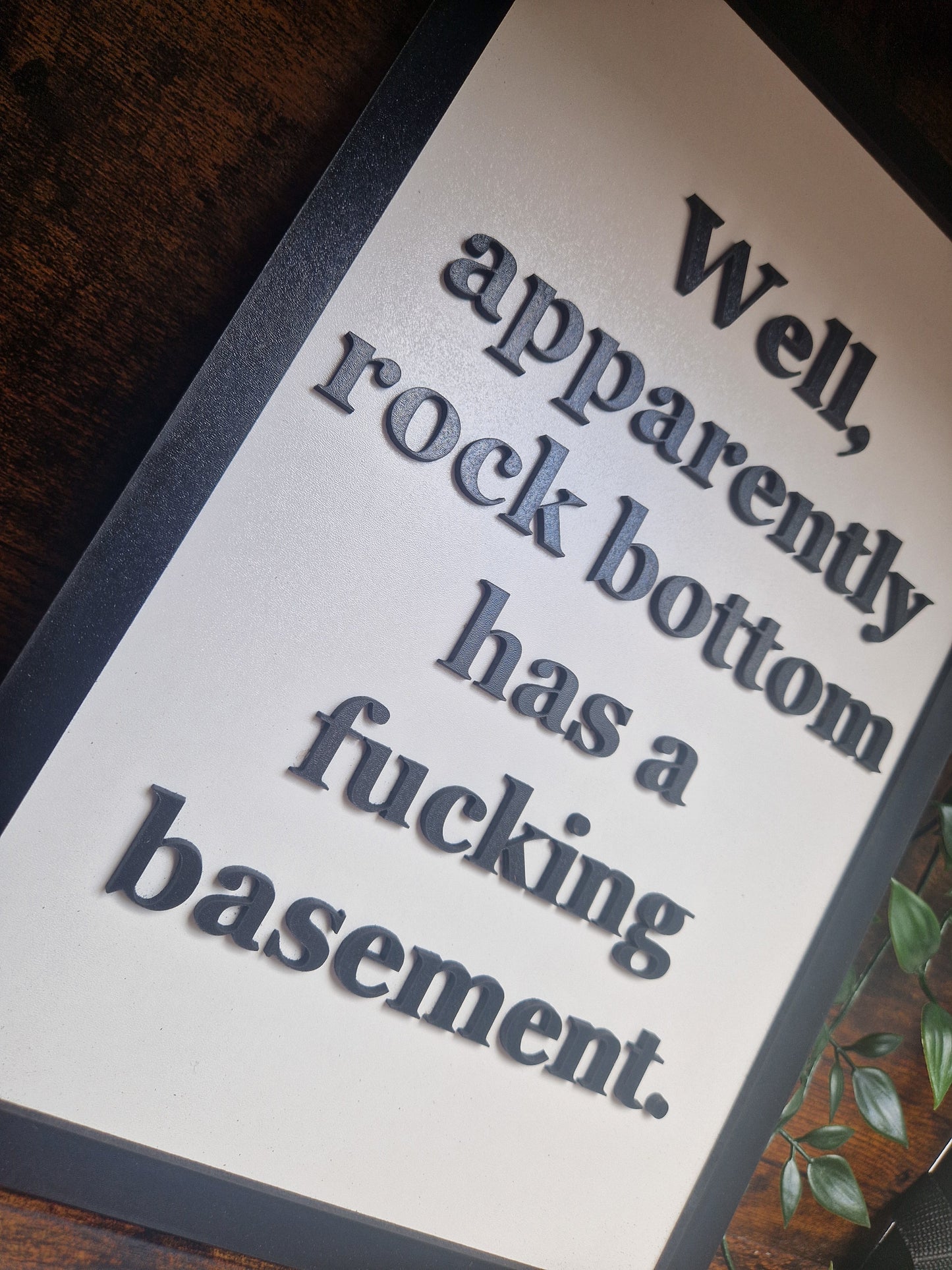 Rock bottom funny sign