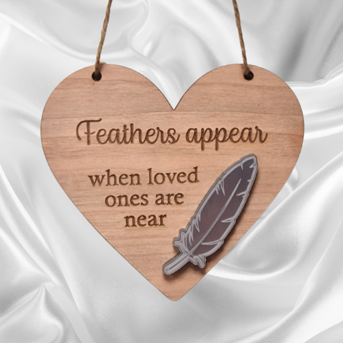 Feathers Appear Hanging Sign