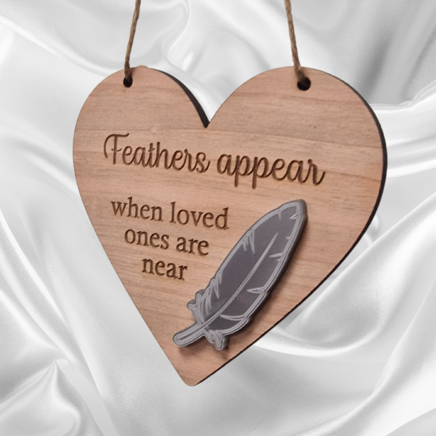 Feathers Appear Hanging Sign